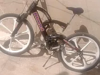 للبيع دراجه هوائيه قياس ٢٦راصور أمامي خلفي مع فاتوره 