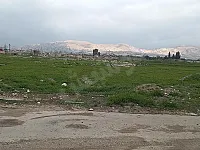 بيع أرض 4300 م² على اتستراد حرستا طابو أخضر قابل للتفاوض