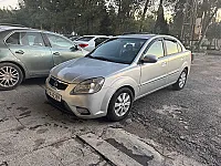 كيا ريو 2011 لون فضي جاهزية عالية دواليب جداد محرك جديد زنار كامل