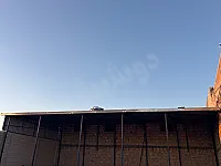 معمل للإيجار مساحة 970متر بداخله هنكار مساحة 200م ارتفاع 5م