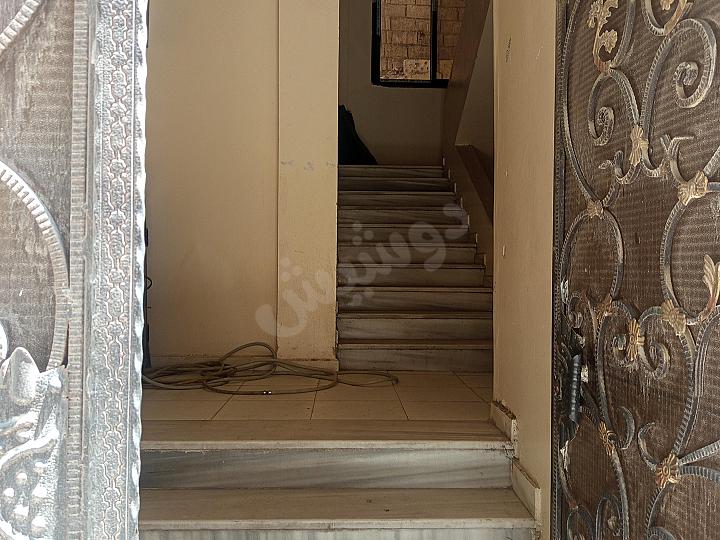 بناء سكني تجاري حديث في عرنوس للبيع 600,000$