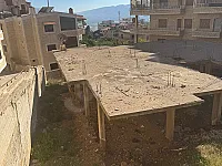 ارض منظمة في بلودان على الشارع الرئيسي مساحة ٨٢٠ متر