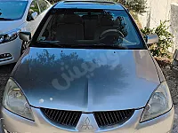 ميتسوبيشي لانسر 2004 أوتوماتيك  وفتحة سقف مستعمل  في طرطوس