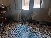 للبيع شقة بحمص بالميدان خلف حلويات ابو اللبن مساحة ١١٥ طابق تاني 