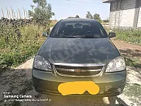 للبيع سيارة شفر وابترا لون زيتي بحالة ممتازة فتحة سقف بلور كهرباء  