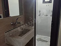 شقة أرضية بأكساء مرتب للبيع في حي القصور دمشق 