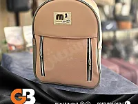 حقيبة الظهر "ميمي" (Mimi Backpack) الأنيقة والمميزة