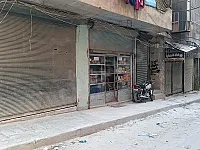 للبيع محل مع سقيفة وواجهة 10م  الشعار طريق الباب جانب مدرسة الكفاح