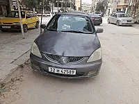 سيارة،لانسر ٢٠٠٦ بحالة وجاهزية ممتازة