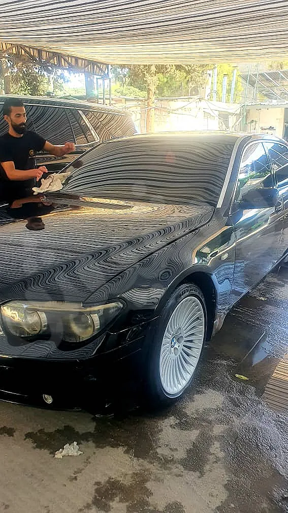 سيارا بي ام 740 بحالا جيدا جدآ خالي برا جوا كاملا مسكرا جاهزا عل فحص