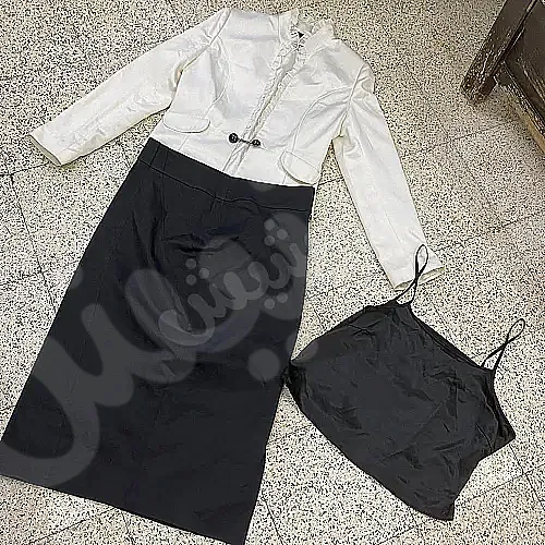 بلوزة مستعملة مع تنورةسوداء للبيع في ميدان وسطاني - دمشق