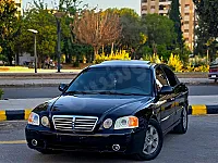 كيا أوبتيما 2001 مستعملة لون أسود ملكي بسعر $6500