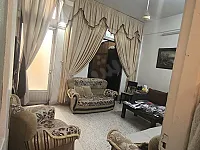 شقة طابق ارضي في منطقة مساكن برزة نسق ثاني عن الشارع العام منطقة حيوية