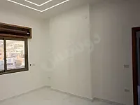 شقة للبيع بالهامة طريق الوادي 90م² غرفتين بسعر 60,000$